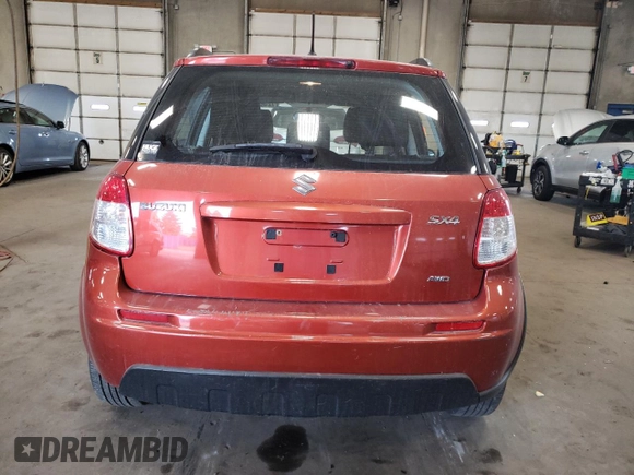 2012 Suzuki SX4 Crossover with VIN JS2YB5A38C6303263, listed as a Copart auction lot 72087524 with 87,503 mi miles and Salvage Title. Bid and sale history available at carsss.com. Image 6.