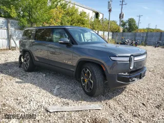 2023 Rivian R1S Adventure with VIN 7PDSGABAXPN010623, listed as a Copart auction lot 72176294 with 0 mi miles and Salvage Title. Bid and sale history available at carsss.com. Image 4.