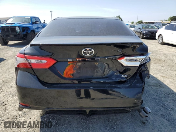 2018 Toyota Camry LE with VIN JTNB11HK9J3055995, listed as a Copart auction lot 54940115 with 110,048 mi miles and Salvage title. Bid and sale history available at DreamBid. Image 6.