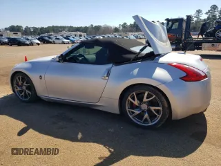 2014 Nissan 370Z Touring with VIN JN1AZ4FH4EM620612, listed as a Copart auction lot 47163375 with 148,458 mi miles and Clean Title. Bid and sale history available at DreamBid. Image 2.