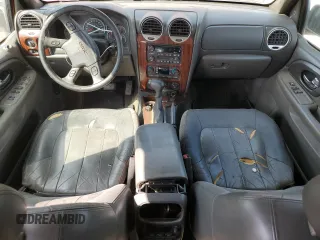 2002 GMC Envoy SLT with VIN 1GKES16S526121741, listed as a Copart auction lot 71957034 with 276,328 mi miles and Salvage Title. Bid and sale history available at DreamBid. Image 8.