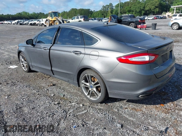 2014 Ford Fusion Titanium with VIN 3FA6P0K98ER197482, listed as a IAAI auction lot 42251293 with 165,520 mi miles and . Bid and sale history available at DreamBid. Image 3.