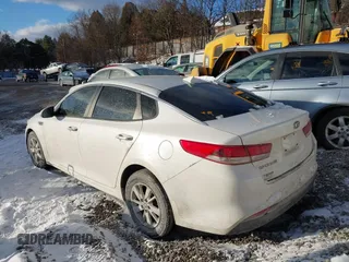 2016 Kia Optima LX with VIN KNAGT4L30G5117378, listed as a IAAI auction lot 41283349 with 107,095 mi miles. Bid and sale history available at carsss.com. Image 3.