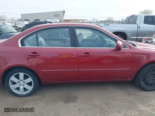 2007 Kia Optima LX with VIN KNAGE124575112468, listed as a IAAI auction lot 41816122 with 177,880 mi miles. Bid and sale history available at carsss.com. Image 13.