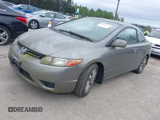 2007 Honda Civic Cpe EX with VIN 2HGFG12817H516082, listed as a IAAI auction lot 42142797 with 170,442 mi miles. Bid and sale history available at carsss.com. Image 2.