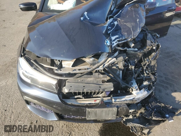2018 BMW 7 Series 740i xDrive with VIN WBA7E4C53JGV23968, listed as a Copart auction lot 77244814 with 0 mi miles and Salvage Title. Bid and sale history available at carsss.com. Image 12.