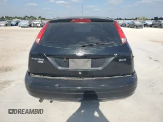 2006 Ford Focus S z VIN 1FAHP37N36W176473, wystawiony jako Copart lot #53781985 z przebiegiem 154 954 mil mil oraz Szkoda całkowita • Salvage title. Historia ofert i sprzedaży dostępna na DreamBid. Obrazek 6.