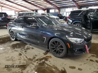 2015 BMW 4 Series 428i with VIN WBA3N3C5XFK233739, listed as a Copart auction lot 44397645 with 113,934 mi miles and Clean Title. Bid and sale history available at DreamBid. Image 4.