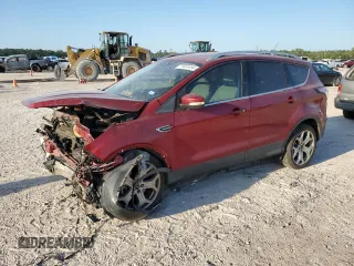 2017 Ford Escape Titanium with VIN 1FMCU0J97HUD52930, listed as a Copart auction lot 71851014 with 101,467 mi miles and Salvage Title. Bid and sale history available at carsss.com. Image 1.