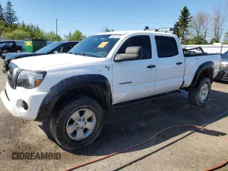 2011 Toyota Tacoma z VIN 5TFMU4FN3BX002545, wystawiony jako Copart lot #56505765 z przebiegiem 448 937 mil mil oraz Szkoda całkowita • Salvage title. Historia ofert i sprzedaży dostępna na DreamBid. Obrazek 1.