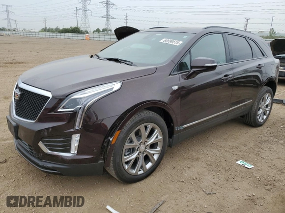 2021 Cadillac XT5 AWD Sport with VIN 1GYKNGRS2MZ142286, listed as a Copart auction lot 60699515 with 17,406 mi miles and Salvage title. Bid and sale history available at DreamBid. Image 1.