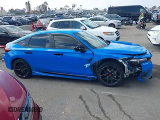 2024 Honda Civic Sport Touring z VIN 19XFL1G86RE029798, wystawiony jako IAAI lot #41469492 z przebiegiem 13 104 mil mil oraz . Historia ofert i sprzedaży dostępna na DreamBid. Obrazek 13.
