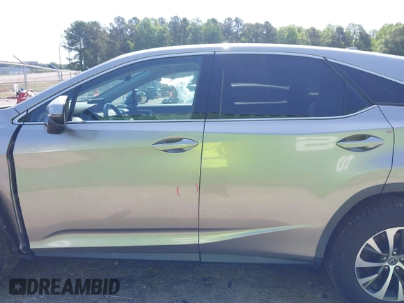 2021 Lexus RX 350 with VIN 2T2AZMAA3MC186617, listed as a IAAI auction lot 42226167 with 133,435 mi miles and . Bid and sale history available at DreamBid. Image 14.