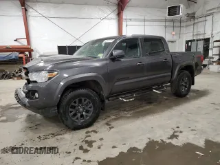 2023 Toyota Tacoma SR z VIN 3TYCZ5AN2PT144655, wystawiony jako Copart lot #52107175 z przebiegiem 21 285 mil mil oraz Szkoda całkowita • Salvage title. Historia ofert i sprzedaży dostępna na DreamBid. Obrazek 1.