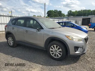 2014 Mazda CX-5 Sport with VIN JM3KE2BE7E0350965, listed as a Copart auction lot 60130195 with 196,072 mi miles and Clean title. Bid and sale history available at DreamBid. Image 4.