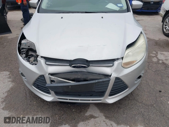 2012 Ford Focus SE с VIN 1FAHP3F25CL422055, выставлен на аукционе IAAI как лот 42442051 с пробегом 129 435 миль миль и . История ставок и продаж доступна на DreamBid. Изображение 6.