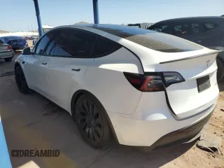 2021 Tesla Model Y Performance z VIN 5YJYGDEF5MF215870, wystawiony jako Copart lot #52531015 z przebiegiem 21 904 mil mil oraz Szkoda całkowita • Salvage title. Historia ofert i sprzedaży dostępna na DreamBid. Obrazek 2.