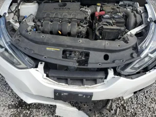 2018 Nissan Sentra SV z VIN 3N1AB7AP8JY249921, wystawiony jako Copart lot #55950335 z przebiegiem 57 560 mil mil oraz Szkoda całkowita • Salvage title. Historia ofert i sprzedaży dostępna na DreamBid. Obrazek 11.