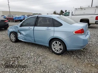 2009 Ford Focus SEL with VIN 1FAHP37N39W112583, listed as a Copart auction lot 86530284 with 164,204 mi miles and Salvage Title. Bid and sale history available at carsss.com. Image 2.