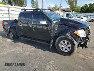2007 Nissan Frontier SE with VIN 1N6AD07U67C424645, listed as a Copart auction lot 56223605 with 113,844 mi miles and Salvage title. Bid and sale history available at DreamBid. Image 4.