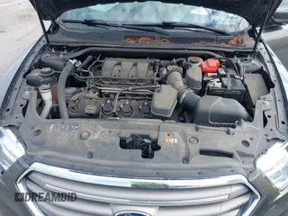 2019 Ford Taurus SEL with VIN 1FAHP2E87KG105434, listed as a IAAI auction lot 41365944 with 54,650 mi miles and . Bid and sale history available at carsss.com. Image 10.