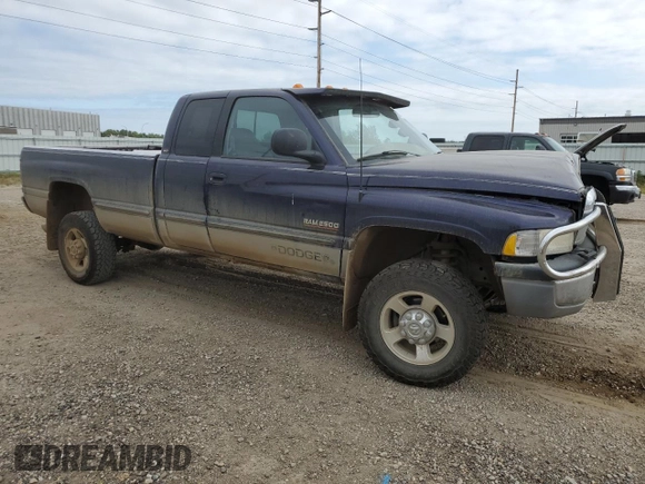 1999 Dodge Ram 2500 with VIN 1B7KF2368XJ511110, listed as a Copart auction lot 68945174 with 173,983 mi miles and Salvage Title. Bid and sale history available at carsss.com. Image 4.
