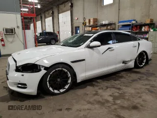 2014 Jaguar XJ Portfolio с VIN SAJWJ2GD2E8V69597, выставлен на аукционе Copart как лот 57798145 с пробегом 100 857 миль миль и Списание • Salvage title. История ставок и продаж доступна на DreamBid. Изображение 1.