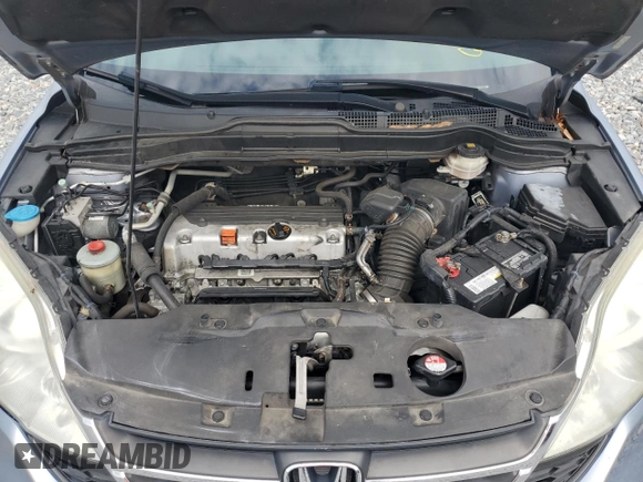 2010 Honda CR-V LX with VIN 5J6RE3H35AL020263, listed as a Copart auction lot 62840615 with 122,945 mi miles and Salvage title. Bid and sale history available at DreamBid. Image 12.
