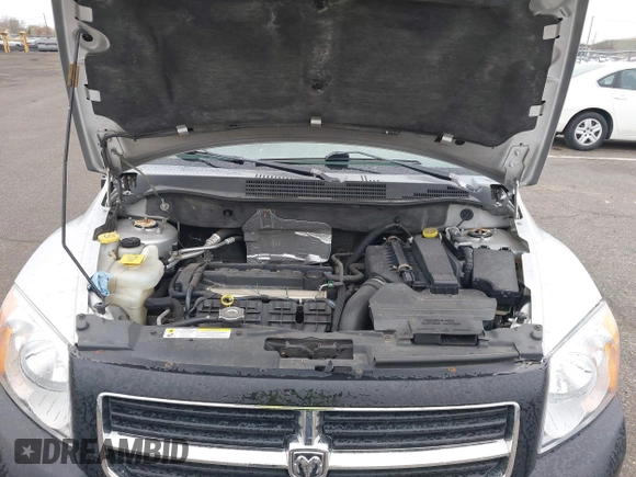 2007 Dodge Caliber SXT with VIN 1B3HB48BX7D379555, listed as a IAAI auction lot 42022554 with 99,670 mi miles and . Bid and sale history available at DreamBid. Image 10.