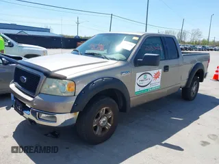 2005 Ford F-150 XLT with VIN 1FTPX14535FB40621, listed as a IAAI auction lot 42130458 with 122,764 mi miles. Bid and sale history available at carsss.com. Image 2.