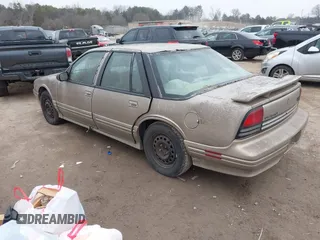 1996 Oldsmobile Cutlass Supreme S z VIN 1G3WH52M9TF377685, wystawiony jako IAAI lot #41496775 z przebiegiem 197 366 mil mil oraz . Historia ofert i sprzedaży dostępna na DreamBid. Obrazek 3.