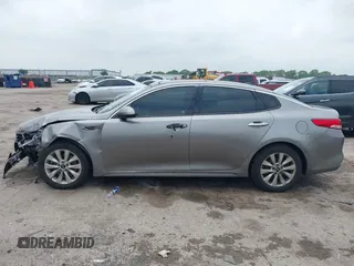 2017 Kia Optima EX with VIN 5XXGU4L35HG121651, listed as a IAAI auction lot 42155324 with 204,302 mi miles and . Bid and sale history available at DreamBid. Image 14.