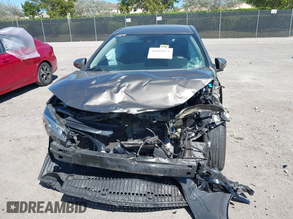 2019 Toyota Corolla L with VIN 2T1BURHE0KC204159, listed as a IAAI auction lot 41841875 with Not Provided miles. Bid and sale history available at carsss.com. Image 13.
