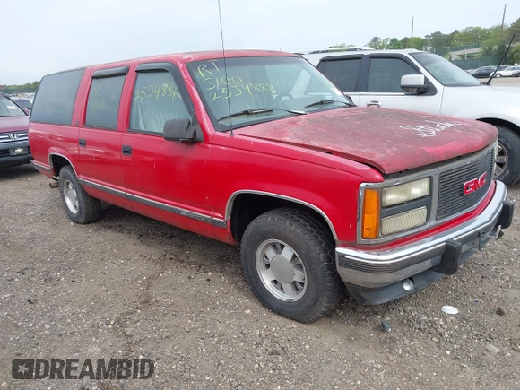 1992 GMC Suburban z VIN 1GKEC16K9NJ722021, wystawiony jako IAAI lot #42255371 z przebiegiem 180 966 mil mil oraz . Historia ofert i sprzedaży dostępna na DreamBid. Obrazek 1.