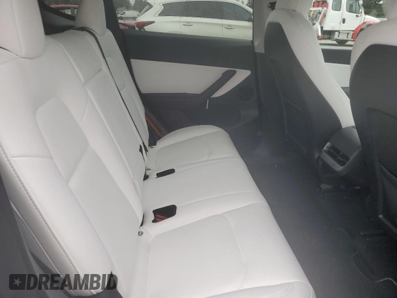 2022 Tesla Model Y Long Range z VIN 7SAYGDEE6NF429651, wystawiony jako Copart lot #57172355 z przebiegiem 19 499 mil mil oraz Szkoda całkowita • Salvage title. Historia ofert i sprzedaży dostępna na DreamBid. Obrazek 11.
