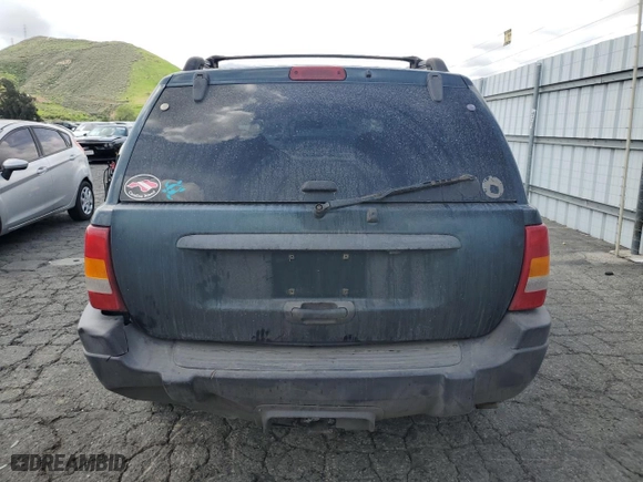 2004 Jeep Grand Cherokee Laredo with VIN 1J4GX48N94C397241, listed as a Copart auction lot 49183315 with 189,099 mi miles and Salvage Title. Bid and sale history available at carsss.com. Image 6.