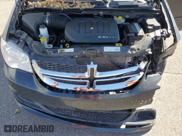 2014 Dodge Grand Caravan SE with VIN 2C4RDGBG2ER341797, listed as a Copart auction lot 49439405 with 102,633 mi miles and Salvage Title. Bid and sale history available at DreamBid. Image 14.