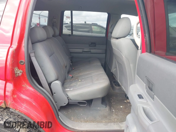 2005 Dodge Durango SXT z VIN 1D4HB38N15F584771, wystawiony jako IAAI lot #41922218 z przebiegiem 143 933 mil mil oraz . Historia ofert i sprzedaży dostępna na DreamBid. Obrazek 8.