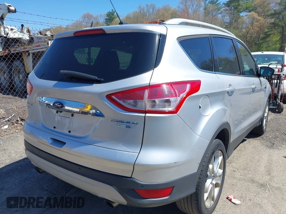 2016 Ford Escape Titanium with VIN 1FMCU9JXXGUA51537, listed as a IAAI auction lot 42118922 with 109,439 mi miles. Bid and sale history available at carsss.com. Image 4.