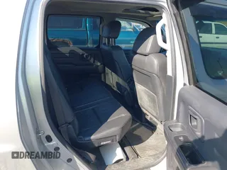 2009 Honda Ridgeline RTL with VIN 2HJYK16569H002832, listed as a IAAI auction lot 41683669 with 154,220 mi miles and . Bid and sale history available at DreamBid. Image 8.