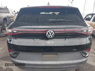 2021 Volkswagen ID.4 Pro S z VIN WVGTMPE26MP065481, wystawiony jako IAAI lot #41719800 z przebiegiem Nie podano mil oraz . Historia ofert i sprzedaży dostępna na DreamBid. Obrazek 17.