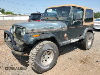 1994 Jeep Wrangler Sahara z VIN 1J4FY49S9RP444314, wystawiony jako Copart lot #65976525 z przebiegiem 189 273 mil mil oraz Czysty tytuł • Clean title. Historia ofert i sprzedaży dostępna na DreamBid. Obrazek 1.