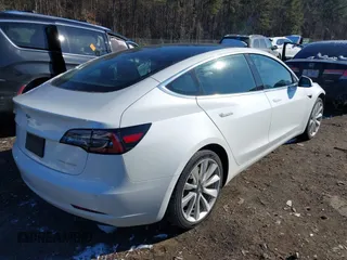 2020 Tesla Model 3 Long Range with VIN 5YJ3E1EB1LF621185, listed as a IAAI auction lot 41375686 with 92,044 mi miles. Bid and sale history available at carsss.com. Image 4.