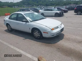2002 Saturn SL z VIN 1G8ZK52732Z222128, wystawiony jako IAAI lot #42476981 z przebiegiem 165 454 mil mil oraz . Historia ofert i sprzedaży dostępna na DreamBid. Obrazek 1.