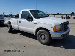 1999 Ford Super Duty F-250 XL with VIN 1FTNF20LXXED61260, listed as a Copart auction lot 59962984 with 396,049 mi miles and Salvage Title. Bid and sale history available at carsss.com. Image 4.