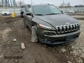 2015 Jeep Cherokee Latitude z VIN 1C4PJMCS7FW515406, wystawiony jako Copart lot #52331155 z przebiegiem 129 815 mil mil oraz Szkoda całkowita • Salvage title. Historia ofert i sprzedaży dostępna na DreamBid. Obrazek 11.