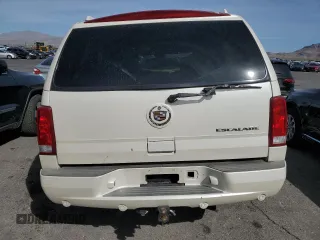 2004 Cadillac Escalade z VIN 1GYEC63T44R185526, wystawiony jako Copart lot #50969335 z przebiegiem 129 386 mil mil oraz Szkoda całkowita • Salvage title. Historia ofert i sprzedaży dostępna na DreamBid. Obrazek 6.
