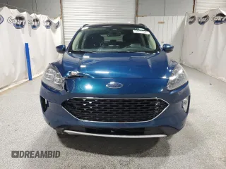 2020 Ford Escape Titanium z VIN 1FMCU9J98LUA93393, wystawiony jako Copart lot #65366925 z przebiegiem 74 750 mil mil oraz Czysty tytuł • Clean title. Historia ofert i sprzedaży dostępna na DreamBid. Obrazek 5.