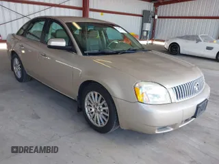 2006 Mercury Montego Premier z VIN 1MEHM42156G615372, wystawiony jako IAAI lot #41947148 z przebiegiem 214 100 mil mil oraz . Historia ofert i sprzedaży dostępna na DreamBid. Obrazek 1.