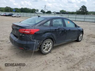 2018 Ford Focus SE z VIN 1FADP3F28JL319269, wystawiony jako Copart lot #59604555 z przebiegiem 167 726 mil mil oraz Szkoda całkowita • Salvage title. Historia ofert i sprzedaży dostępna na DreamBid. Obrazek 3.